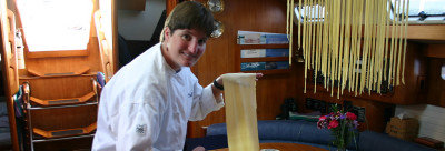chef jette prepares pasta onboard northwind